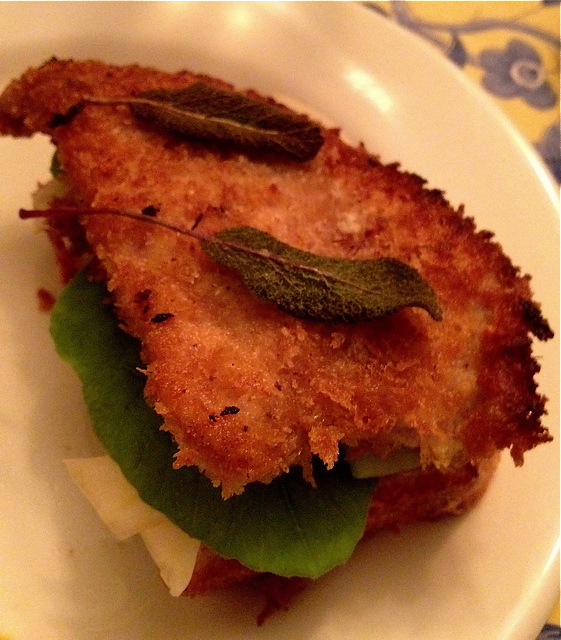 Schnitzel FKS, base to top: warm brioche, whole-grain mustard, lemon-pickled fennel, peppery salad greens, schnitzel and fried sage 